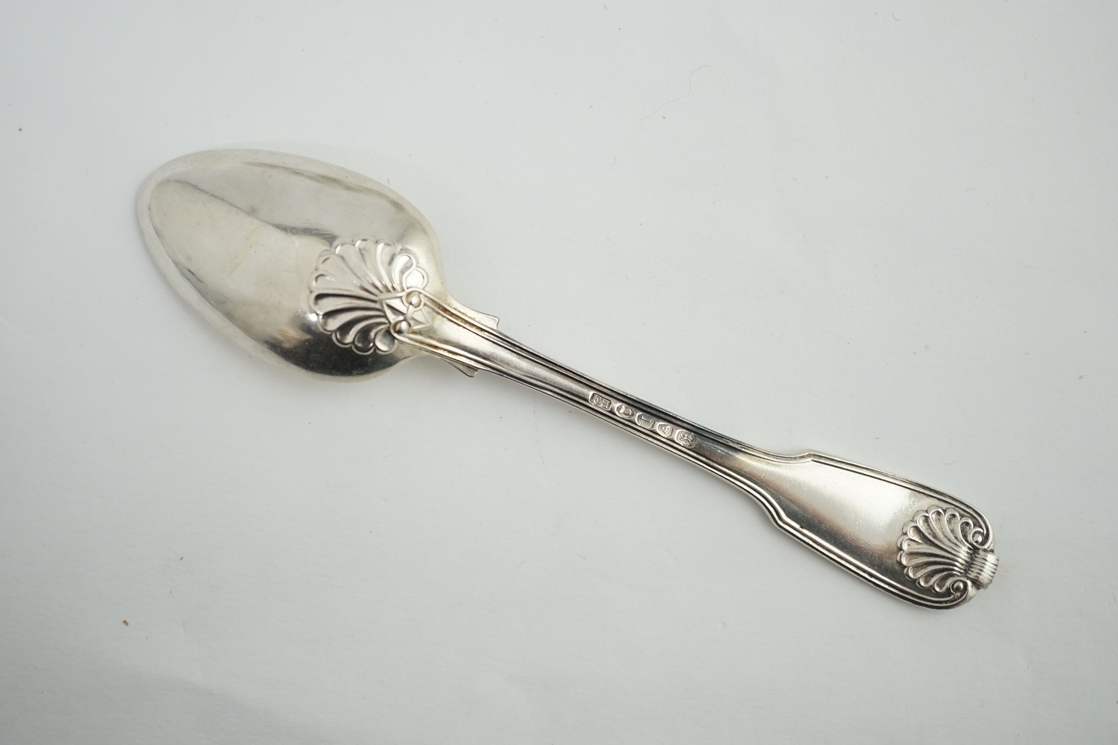 A set of seven George IV silver fiddle, thread and shell pattern dessert spoons, by Francis Higgins II, London, 1826 and another 1789